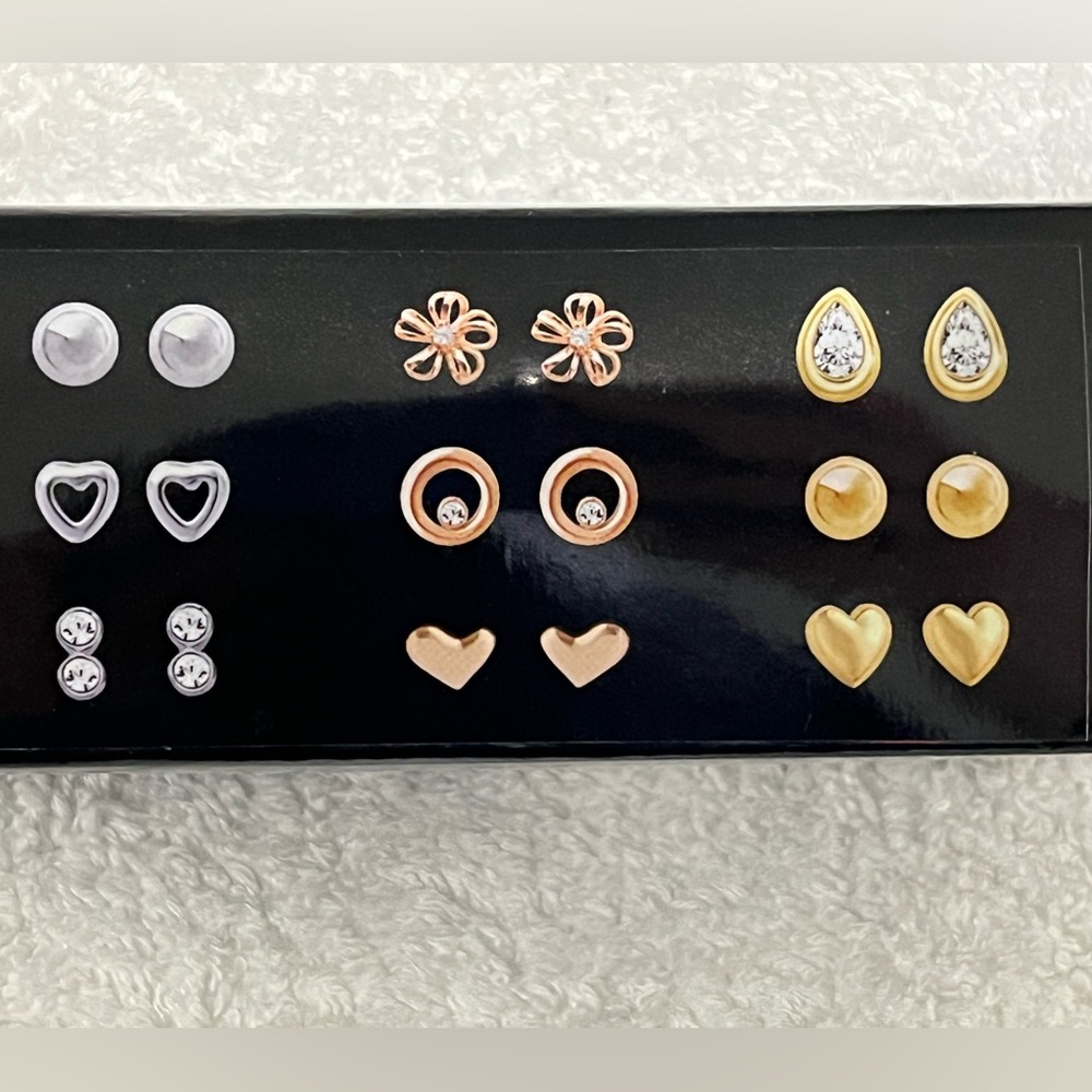 Pierre Cardin authenticated earrings - 9 pairs. Brand new